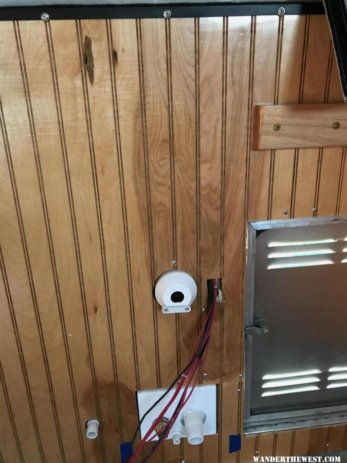 Repositioning wiring, and splicing in paneling to remove hole