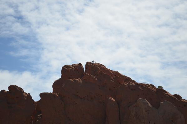 Rock climbers that made it to the top of one of the many formations in Garden of the Gods