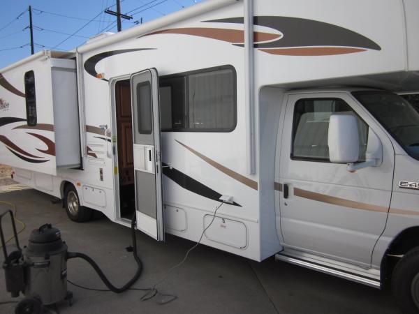 RV with rear slide out.  The rear slide is the cabinets, not the bed.  In other Sunseekers, the bed was on the slide, and cold air came in through the