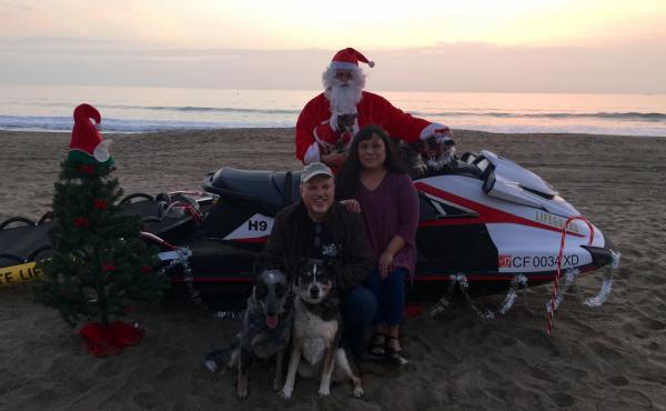 Santa on the Beach adventures -- Santa on a wave runner for the holiday party at Bolsa Chica 11 December 2016. Cooper loves Santa (Cooper the Texas He