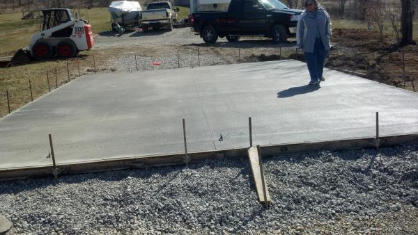 Second step, concrete pad with anchors installed