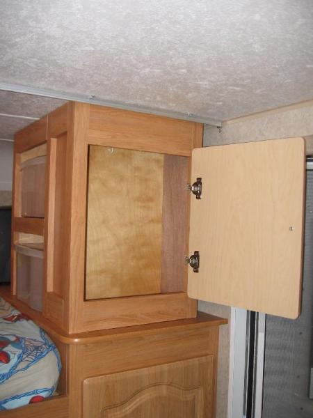 Shallow cabinet, wife uses for her bathroom tote.