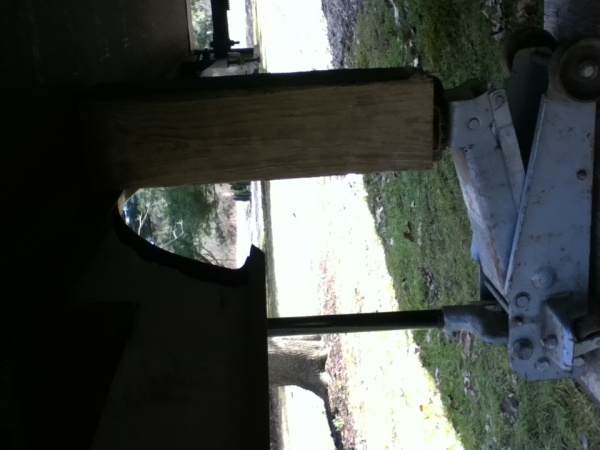 (sideways pic)
Use a floor jack to hold / raise and lower slide.