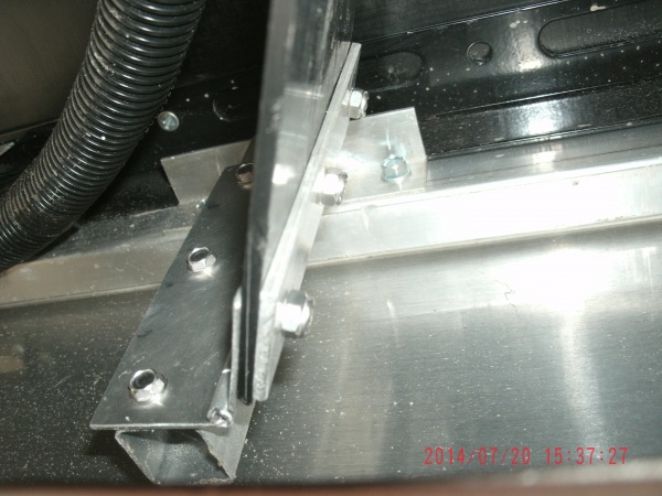 Some stainless self-drilling screws to anchor the hinge on the slide.