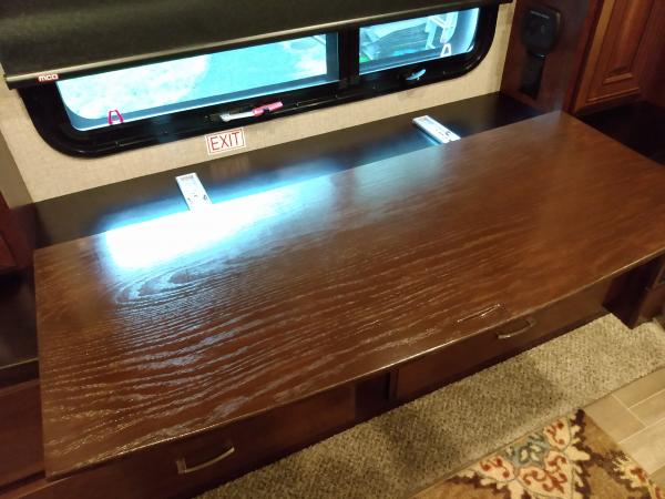 Stained in a dark walnut