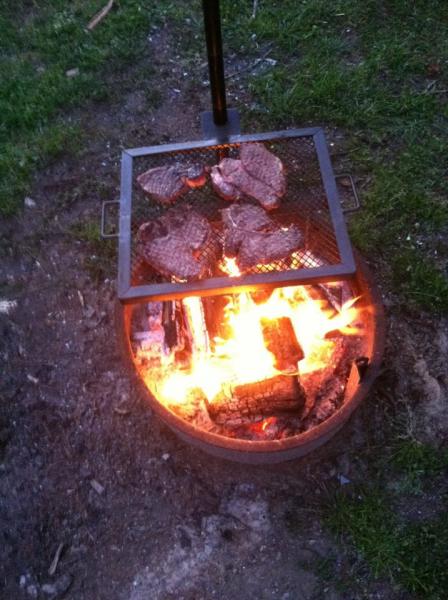 Steaks on the open campfire.