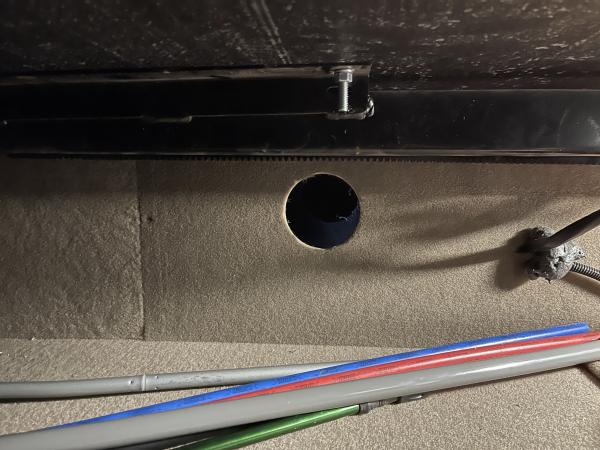 Storage bay escape hatch