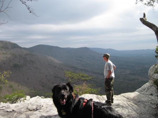 Taylor and Spartacus at an overlook at Cheaha State Park