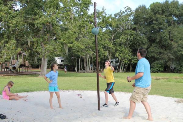 tether ball next to the dog park and playground