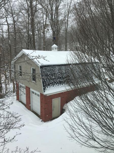 The “MAN CAVE” in a snowstorm. That garage is why I bought the house.