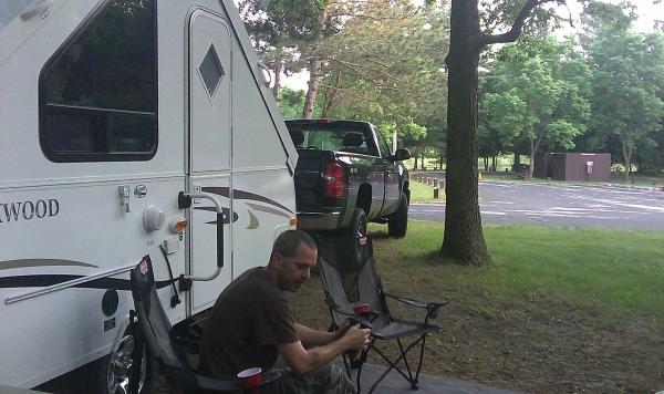 The Hubby relaxing at the campsite