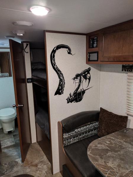 The Kraken wall​ decal: above dinette and thermostat