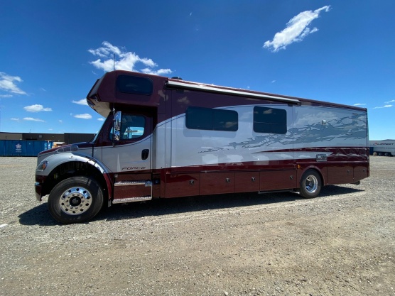 The reflection of windows and clouds on the paint work is interesting.