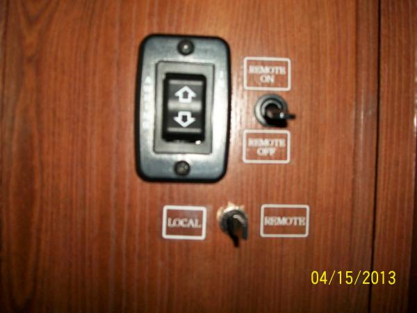 The two switches for the Slide Out Awning were mounted next to the OEM Awning Switch.  The switch to the right controls the power to the RF Remote.  T