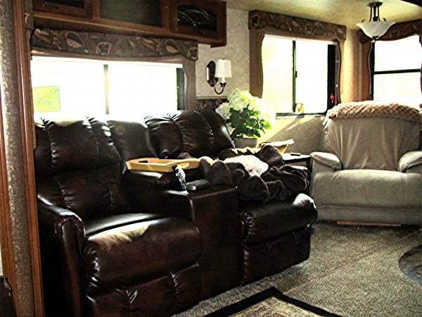 Theater seating and dining room removed and replaced with LazyBoy Power recliner!  Perfection!