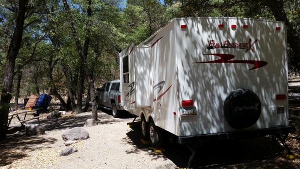 These campsites were set up by CCC in the 1930's.  Tight squeeze and trailer door is on the wrong side.