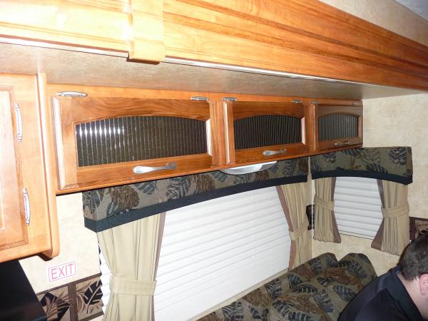 Think Jayco does a better job with interior design and elements.