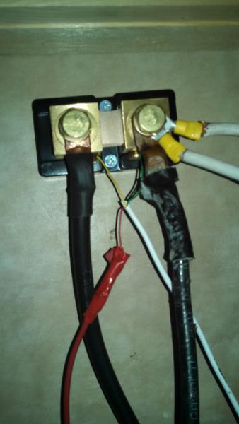 This is a completed wiring install.  The connector on the left runs a single negative 2 AWG wire to the negative post of the battery bank, the post on