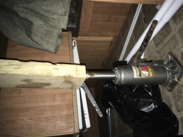 this is how I tested my theory I used 2x4 and made a T out of them. Then I put the bottle jack under it with roof down and jack it up until the sag wa