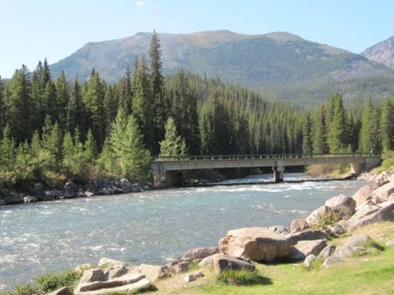 This is Maligne River in Jasper National Park.  You can pull over and have a picnic with fire pits.  Nice spot.  Farther up the road is the Maligne Ca