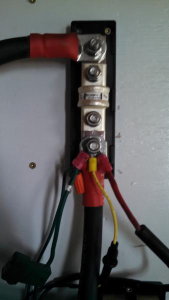 This is the 400 amp in-line fuse without the cover on it.  Notice all of my positive connections that used to be on battery post are now located on th