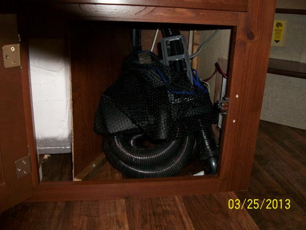 This is the perfect place to store the Central Vacuum hose and attachments.  You can see the Central Vacuum hose connection on the step riser, just to