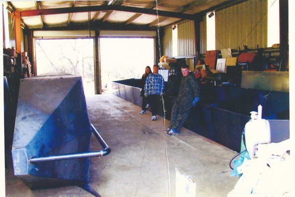 This is the start of the boat, with me taking the picture of my family helpers, we are fabricating the pontoons. After these were done I hauled them t