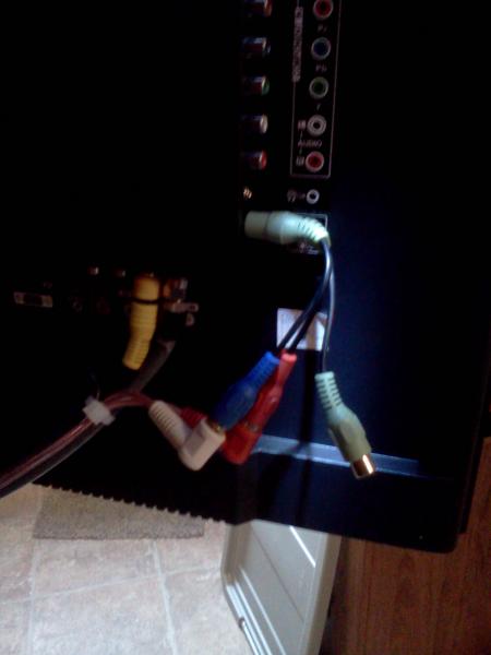 This shows how it's connected.  The red/white connectors are standard audio male cable ends.  The green connector has three leads, one green, one blue