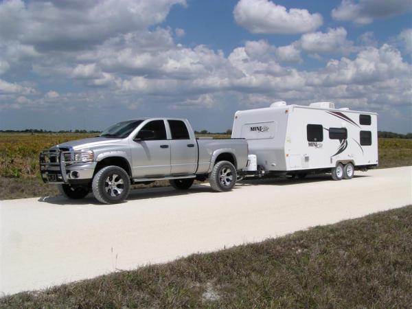 Truck and trailer down the shell road