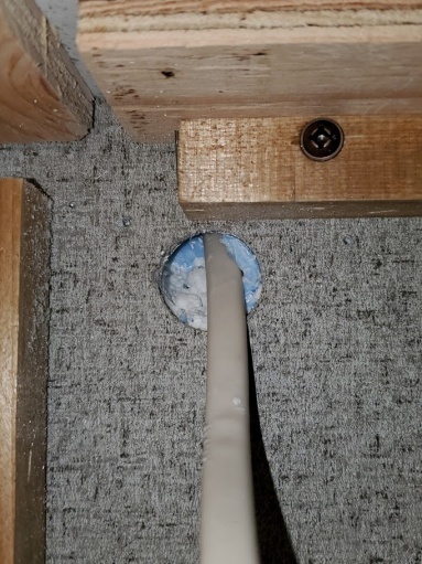 under cabinet hole