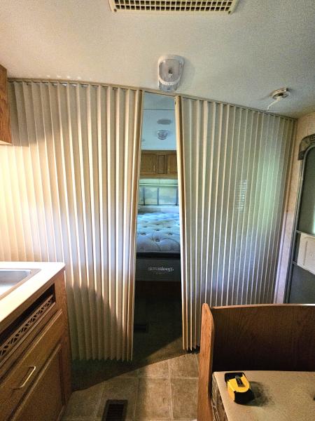 View from Dining Area into Bedroom with slides for privacy