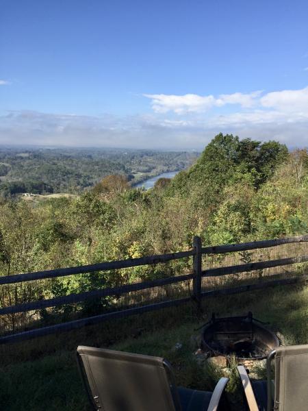 View of French Broad River from site P-4 @ Campfire Lodgings.