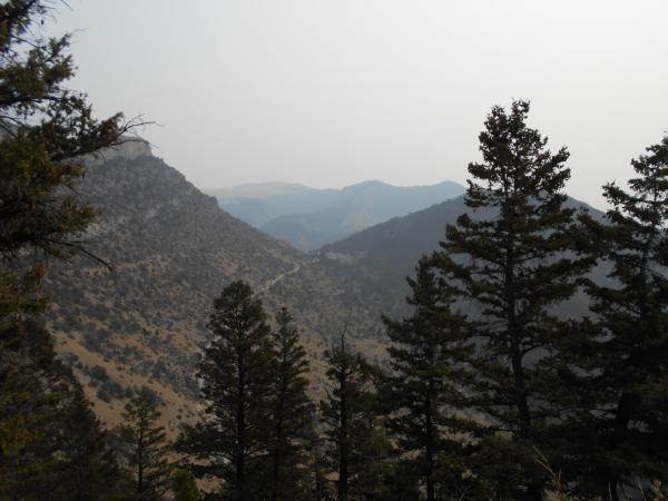 View of the visitor center complex in the distance from entrance to Lewis & Clark Caverns - Lewis & Clark Caverns State Park - southwestern Montana