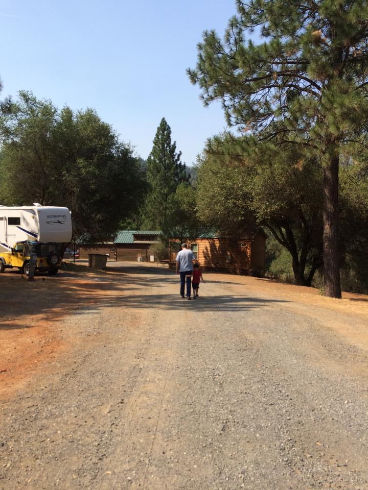 walking with daddy at Yosemite Pines RV park