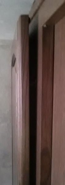 warped bathroom closet door