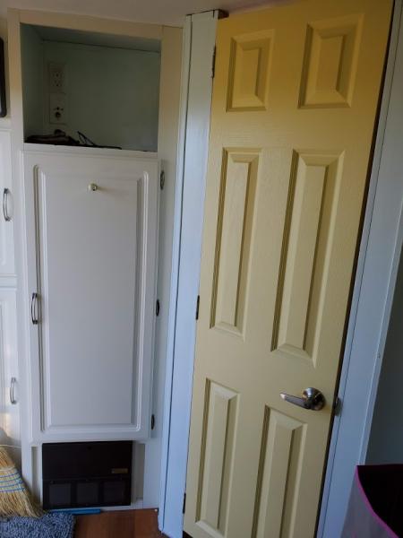 We painted the bathroom door Yellow to go with the blue walls.  I love the cheery yellow door.