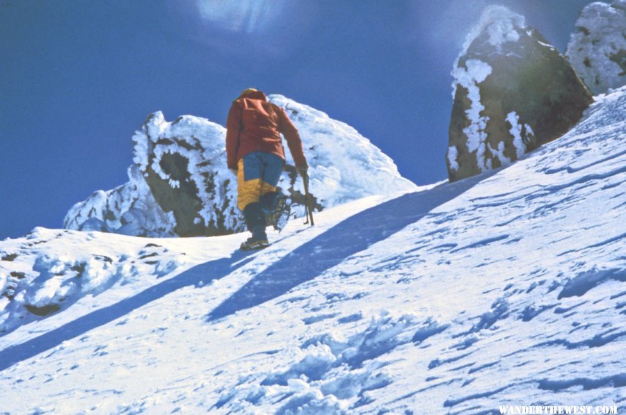 We use crampons and axes to get up the crusty snow near the summit.