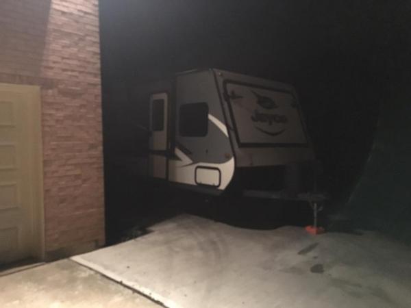 Welcome home big guy.  Picked up the camper and pulled it home from where we were keeping it at a co-workers house over 50 miles away...  Backing it i