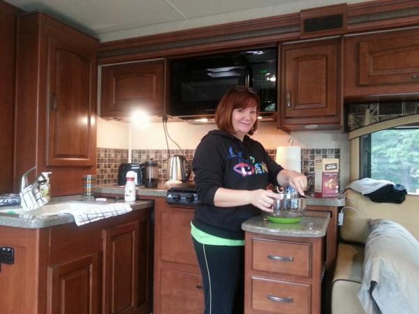 Wendy cooking something delicious in beautiful kitchen