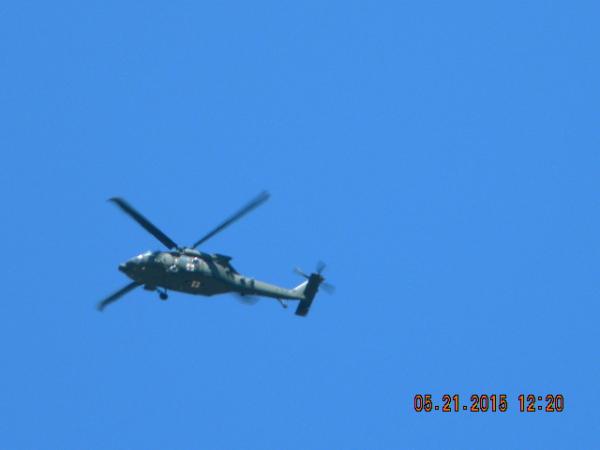 When you're taking a lot of photographs around an Army Base, expect to be "checked out."  This guy actually hovered over us for a few seconds, then fl