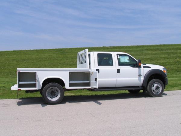 While this is a Ford, our crew cab Ram 3500 dually will be up fitted with this low-profile Knapheide Westerner utility bed and a Reese Elite 25k hitch