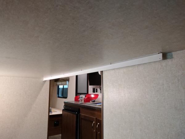 wide view of lower bunk curtain track