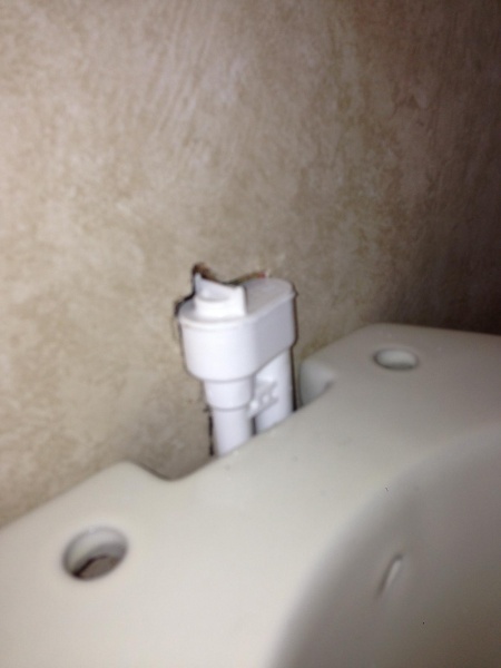 with lid removed the water valve still hit the wall. i thought that someone sitting on it would eventually break it so i relieved the wall around the 