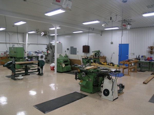 wood working side of this 7700 square foot building, this room is 2000 square feet, it has wood stove and four 60,000 btu propane infrared heaters abo