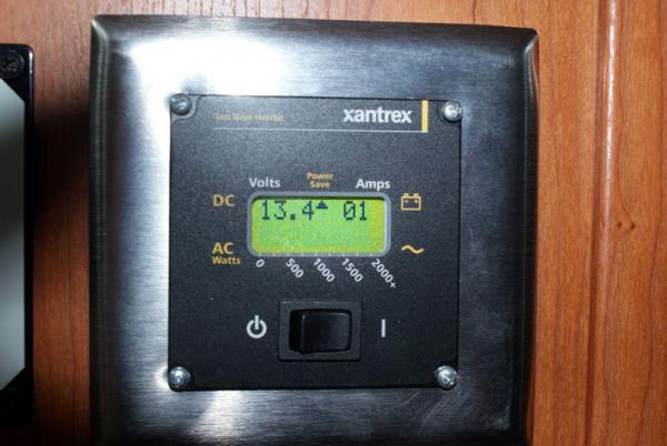 Xantrex Inverter control panel inside motorhome.  Mounted just above the motorhome control center which houses the slide, water pump and water heater 