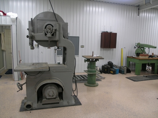 Yates American band saw 30” circa 1931. Just to the right is a Max spindle sander U.S. made before he died and his daughters sold the designs to a Tai