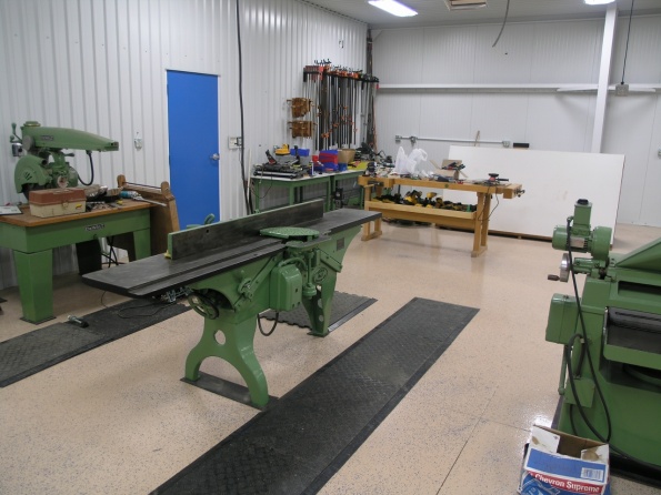 Yates American joiner 1932 and on the left 16” 7.5 hp Dewalt radial arm saw, 1956. Partially in view on the right is 9hp SCMI Italian made planer. The